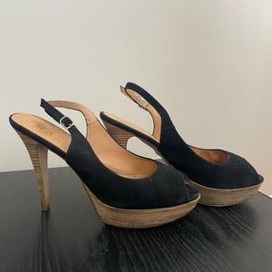 Black suede slingback open toe pumps